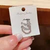 Diseño de Nicho Retro Ola Curva Clip para Oreja sin Perforación Clip para Oreja de Circonita Moda Exquisita Lujo Ligero Pendientes Transfronterizos