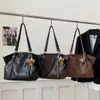 Otoño e Invierno 2025 Popular Bolso de Hombro de Cuero Suave Moderno Bolso Tote de Gran Capacidad Casual Más Fácil de Combinar Bolso para Mujer para el Trabajo Bolso de Axila