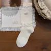 Colección de otoño transfronteriza: ribete de encaje coreano estilo ballet, etiqueta de tela, calcetines de longitud media con volantes, calcetines elásticos de encaje para mujer estilo princesa