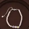 Cuentas redondas de cristal rosa, pulsera de flor de cuentas de cristal de colores y perlas, sensación de lujo ligero de alta gama, accesorio de mano versátil vintage