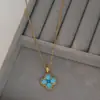 Cadena de Clavícula Elegante Chapada en Oro Real con Circonitas Micro-Pavimentadas para Mujer Cadena de Suéter de Lujo Accesible Turquesa Azul Trébol de Cuatro Hojas