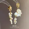 Pendientes de Borla de Perla de Caracol de Concha de Aguja Plateada Pendientes de Botón Estilo Retro Francés de Corte Lujo Ligero Sensación de Alta Gama Adornos para la Oreja Venta al por Mayor