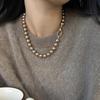 Collar de Ojo de Tigre con Perlas Color Caramelo Maillard Nuevo Primavera 2025 Personalidad de Nicho Cadena para Clavícula de Alta Gama para Mujeres