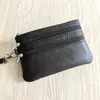 Carteira de moedas de couro bovino de primeira camada, porta-chaves de couro genuíno feminino, bolsa de pulso com zíper, carteira curta solta de couro bovino, atacado
