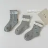 Q812622 Calcetines de encaje dulces estilo japonés, versión coreana de otoño e invierno, calcetines de algodón transpirables de tubo medio con lazo para chica ins