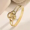 Pulsera Aogu Transfronteriza Simple y Única Chapada en Oro de 18K con Circonita y Moño de Acero Inoxidable para Mujer, Joyería Personalizada de Nicho