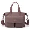 Bolsa de ombro feminina transfronteiriça de grande capacidade, bolsa de mão de nylon multicamadas moderna e versátil, bolsa tiracolo simples e leve