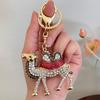 Novo desenho animado criativo diamante incrustado deserto camelo carro chaveiro metal animal bolsa pingente pequeno presente acessórios