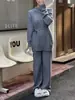 Conjunto de dos piezas de suéter de punto estilo francés sin hombros con cintas y pantalones de pierna ancha de cintura alta, nuevo traje de punto elegante para mujer otoño e invierno 2026