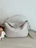 Bolso de mujer 2026 modelo nuevo, bolso tejido de un solo hombro cruzado, bolso cuadrado pequeño elegante, versión coreana de moda, bolso versátil para debajo del brazo con un ambiente elegante