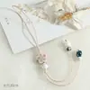 Colgantes de cerámica de Jingdezhen recién cocidos en horno, perfectos para novias, estudiantes y como dijes para bolsos.; cordones con borlas únicos que no se decoloran