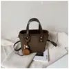 2026 Principios de Otoño Nuevo Diseño de Nicho Casual Personalidad Bolso Cruzado de un Solo Hombro Alto Valor Moda Color Sólido Bolso Cubo Tendencia