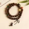 Suministro de fábrica pulsera de cerámica nueva estilo étnico retro chino pulsera elástica pulsera antigua para mujer doble círculo plegada