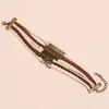 Pulsera Trenzada Multicapa para Hombre de Bicicleta Nueva Europea y Americana Cruzada de Piedra Negra Joyería de Cuero Retro de Moda