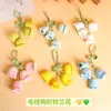 Bolsa de crochê de lã com ornamentos de flor de lírio e orquídea, flor acabada, estilo Ins, coração de menina, chaveiro de flor eterna, pequeno presente