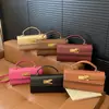 Bolsa de Mão Transfronteiriça para Mulheres 2025 Novo Modelo Pequena Bolsa Quadrada de Comércio Exterior Popular Bolsa Kelly Versátil Bolsa de Ombro Transversal