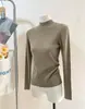 Camiseta Base de Punto con Cuello Alto y Hilo de Mecha para Mujer Otoño e Invierno 2026 Suéter con Cuello Alto y Hombro Normal