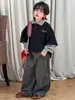Pantalones vaqueros elegantes para niño 2026 transfronterizos, pantalones de niño estilo coreano para otoño con bragueta, pantalones de pierna ancha para comercio exterior