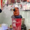 Suministro directo de fábrica marea nacional explosiva fuego viento té bebida tienda de té con leche tetera pequeña mini punta de dedo para fumar tetera pequeña de arena púrpura con mango