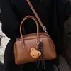 Bolsa de Bowling Retrô Estilo Coreano para Mulheres Outono e Inverno 2025 Nova Moda Bolsa de Ombro de Alto Padrão Bolsa Carteiro Versátil Bolsa Transversal