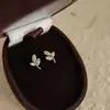 Pendientes de botón de plata de ley S925 chapados en oro de 18 quilates con forma de mini hoja, Pendientes de rama de olivo, Exquisitos pendientes de moda de alta gama estilo francés