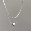 Collar de Hueso de Serpiente con Colgante de Corazón de Doble Capa Transfronterizo para Mujer, Cadena para Suéter de Moda Estilo Coreano y Japonés, Accesorio de Colgante Versátil para Mujer al por Mayor
