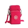 Bolsa diagonal para celular nova no atacado Bolsa pequena feminina Bolsa de tecido para celular bolsa de braço vertical para pescoço porta-moedas de pulso