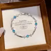 Pulseira de Luxo Leve Estilo Francês com Fecho Oval Flor de Zircônia, Design Único, Joia Exquisita e Versátil