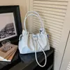 Directo del fabricante: Bolso tipo cubo de moda de gran capacidad para mujer, nueva versión coreana de tendencia 2026, bolso de hombro versátil vintage