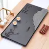 Bandeja de té de piedra Wujin piedra natural completa piedra grande Piedra Oro Negro Mar de té mesa de té simple para el hogar letras del logotipo