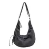 Bolsa de lona de gran capacidad para mujer, nuevo diseño de moda nicho otoño 2026, bolso de hombro y bandolera, bolsa tipo empanada para el día a día