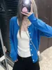 Cárdigan de Punto Hueco Chaleco de Punto Versátil Falda de Cintura Alta Mujer 2026 Otoño Nuevo Holgado Adelgazante Casual 9140