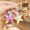 Llavero de estrella de mar acrílica edición limitada de verano colgante de océano accesorio de bolsa asequible para estudiantes decoración pequeña fresca regalo