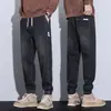 Ropa de Hombre Xintang 2026 Primavera y Otoño Nueva Marca Trendy de Lujo Ligero para Hombre Pantalones Jogger Jeans Ajuste Holgado Pantalones Elásticos