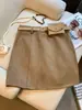 Mini falda de ante peluche ajustada a la cadera para mujer, otoño e invierno, versátil, de cintura alta, adelgazante, anti-exposición, línea A, para chica popular A14897