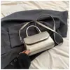 Bolsa cuadrada pequeña portátil al por mayor mini bolsa para lápiz labial de mujer 2024 nueva versión coreana de bandolera simple versátil