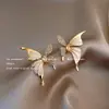 Pendientes de Perlas de Imitación Estilo Barroco de Gama Alta Pendientes de Diamantes Destellantes con Lazo de Nicho Lujo Accesible Pendientes Nuevo Estilo Caliente 2025