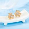 Pendientes de botón de circonita con diseño de flores de estilo coreano, elegantes pendientes de botón de hierba de tres pétalos de oro rosa para mujer, joyería