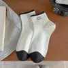 Calcetines sin costuras para mujer, calcetines cortos finos de primavera y verano con etiqueta de tela de encaje, diseño lindo de perro, estilo Ins moderno, calcetines de algodón de corte bajo al por mayor