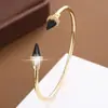 Pulsera ajustable multiforma estilo popular cruzada anillo de diseño único con circonita microincrustada venta al por mayor