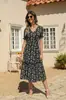 Vestido de verano nuevo sexy con cuello en V bohemio de playa para mujer europea y americana, vestido de gasa estampado para el día a día