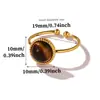 Anillo abierto redondo estilo vintage europeo y americano con patrón de sol martillado, acero de titanio, piedra ojo de tigre, perla, anillo ajustable, venta al por mayor