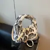 Transfronterizo 2026 nuevo de moda felpa estampado de leopardo elegante y único peludo casual simple bolso de hombro y cruzado tipo cubo