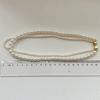 Collar de perlas con lazo para mujer, diseño con sentido de doble capa, cadena de clavícula superpuesta, cadena de collar de alta calidad para desplazamientos diarios.