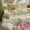 Juego de cuatro piezas de algodón puro de grado A para maternidad e infancia, juego de sábana y funda de edredón frescas y sencillas estilo ins, juego de tres piezas de sábana bajera estilo dormitorio estudiantil