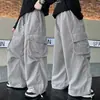 Pantalones de trabajo de pierna ancha para niños, pantalones largos casuales holgados, estilo urbano moderno, pantalones de bolsillo versátiles y a la moda para niños mayores