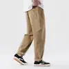 Pantalones casuales color caqui para hombre 2026 otoño e invierno nuevo estilo pantalones holgados cónicos modernos versátiles rectos largos venta al por mayor
