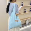 Bolsa de Lona Casual Versátil Estilo Coreano Impresión de Letras Nicho Gran Capacidad Bolso de Hombro Moda Fresca Bolso Sobaco para Mujer