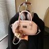 Bolso pequeño transfronterizo con temática de bolos para mujer, nuevo estilo 2026, bandolera versátil y elegante, bolso cruzado estilo Boston