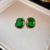 Pendientes ovalados de esmeralda con incrustaciones de aguja de plata y diamantes, estilo retro francés, ligeros y lujosos, de alta gama. Fabricante mayorista.
